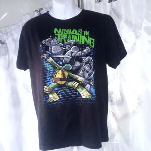 Nickelodeon ninja turtles Tshirt size large ( Bag Y )